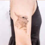 Bird Memorial Tattoos & Symbolism 10 Minimalist & Line-Work Tattoos (4)