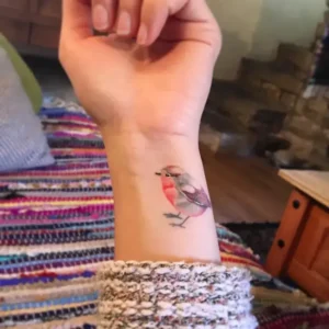 Bird Memorial Tattoos & Symbolism 5 Watercolor & Soft-Tone Tattoos